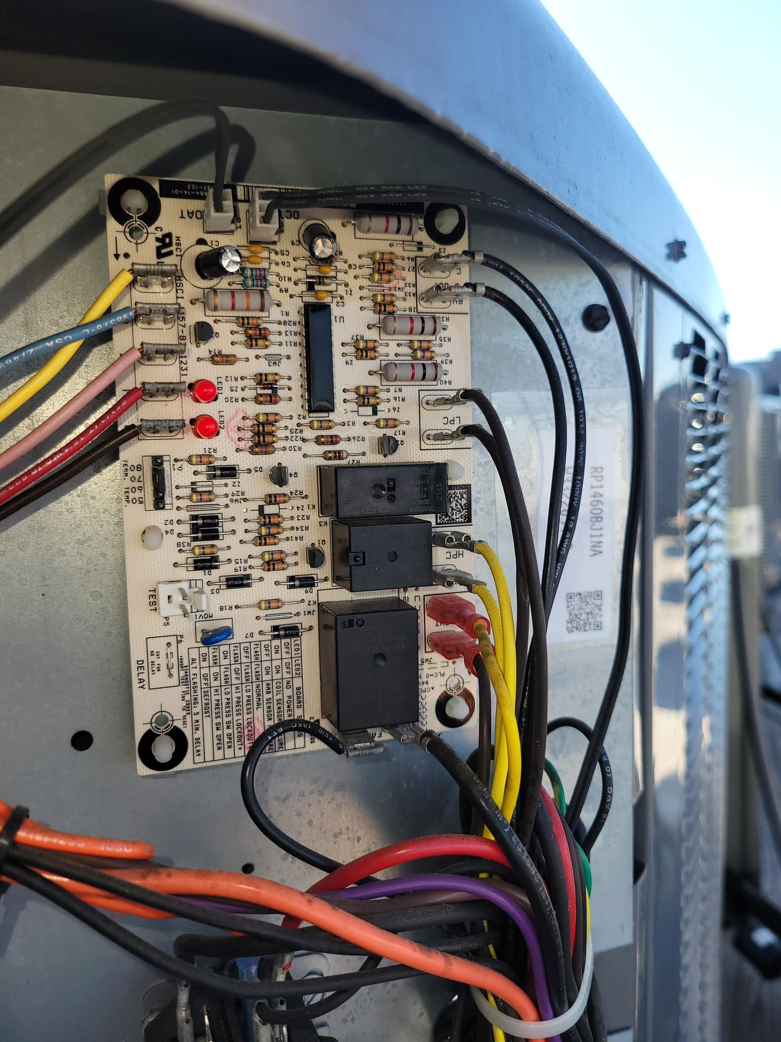 Thermal HVAC technician diagnosing an air conditioning system